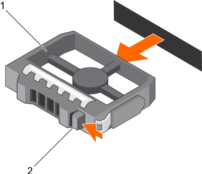 This figure shows removing a 3.5-inch hard drive blank